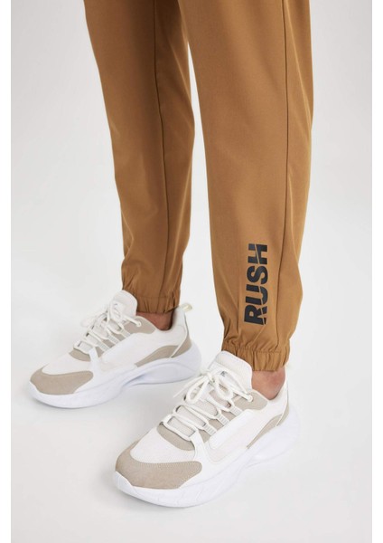Fit Dokuma Sporcu Jogger Eşofman Altı Slim Fit Dar Kesim Çift Cepli C1212AX24SP