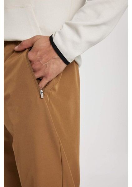 Fit Dokuma Sporcu Jogger Eşofman Altı Slim Fit Dar Kesim Çift Cepli C1212AX24SP