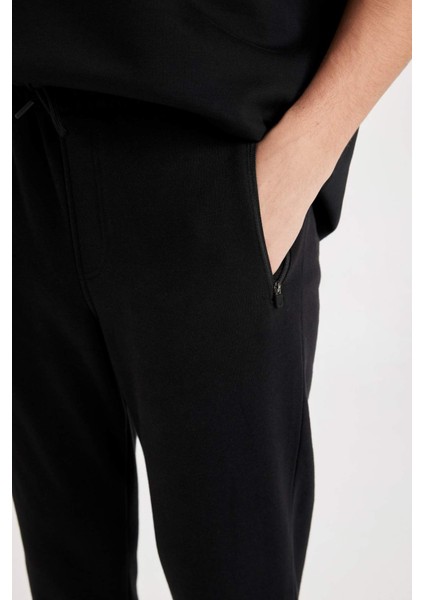 Jogger Eşofman Altı Slim Fit Dar Kesim Beli Bağcıklı Lastikli Paça Fermuar Cepli A4387AX24AU