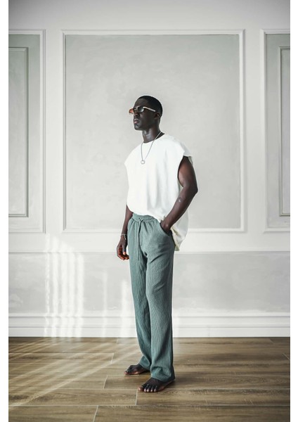 Oversize Dokulu Yuvarlak Yaka Kolsuz T-Shirt Beyaz fırsatları