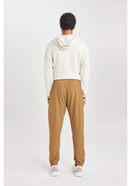 Fit Dokuma Esnek Multifonksiyonel Sporcu Jogger Eşofman Altı Slim Fit Dar Kesim Çift Cepli C1212AX24AU