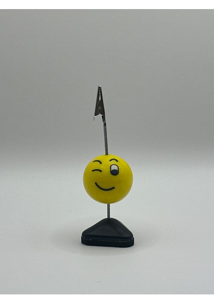 Göz Kırpan Emoji Tasarımlı Masaüstü Not Tutucu – Siyah Tabanlı Klipsli Notluk
