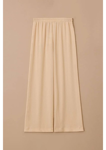 Kadın Elastik Bel Dökümlü Bol Paça Pantolon - Bej