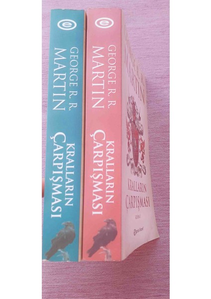 Oyunları - 7 Kitap. Kralların Carpısması 1-2. Kargaların Ziyafeti 1-2. Ejderhaların Dansı 2. Kılıçların Fırtınası. 2. Taht Oyunları Cıldı Olmak Uzere 7 Kıtap