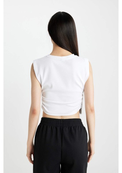 Slim Fit Dar Kesim Bisiklet Yaka Basic Düz Kolsuz Beyaz Tişört A9420AX24SP