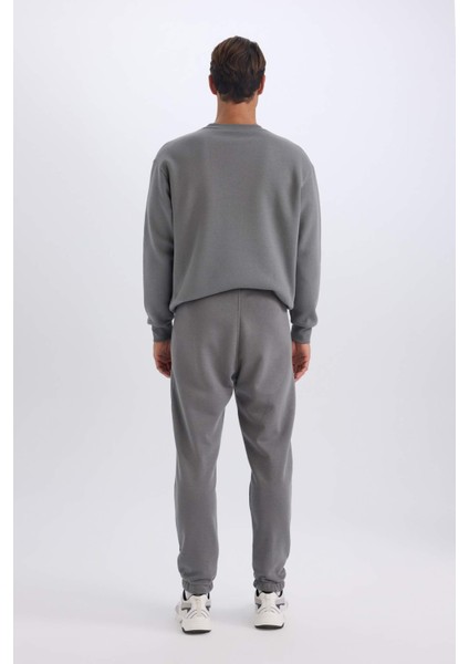 Jogger Eşofman Altı Standart Fit Basic Düz Beli Bağcıklı Lastikli Paça Cepli A6468AX24AU