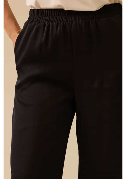 Kadın Elastik Bel Dökümlü Bol Paça Pantolon - Siyah fırsatları