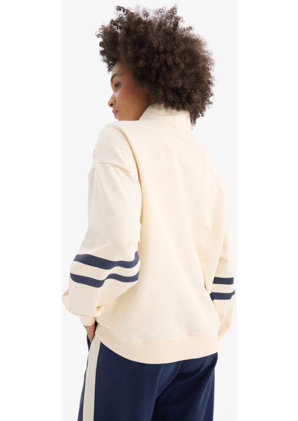 DeFacto Fit Oversize Geniş Kalıp Yarım Fermuarlı Baskılı Sporcu Sweatshirt D7132AX25SP