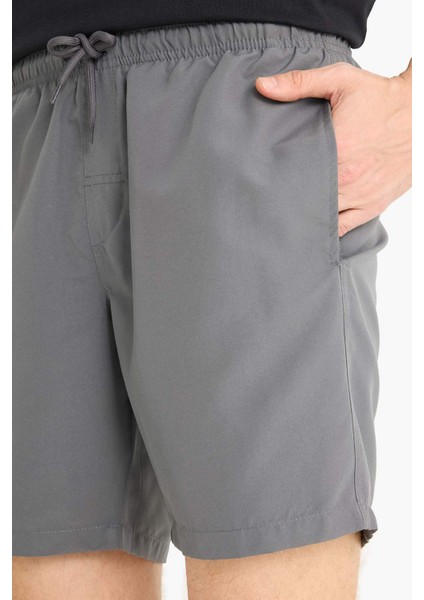 Regular Fit Kısa Boy Cepli File Astarlı Beli Bağcıklı Düz Hafif Kumaş Deniz Şortu E5133AXNS
