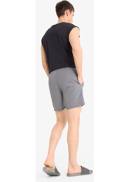 Regular Fit Kısa Boy Cepli File Astarlı Beli Bağcıklı Düz Hafif Kumaş Deniz Şortu E5133AXNS
