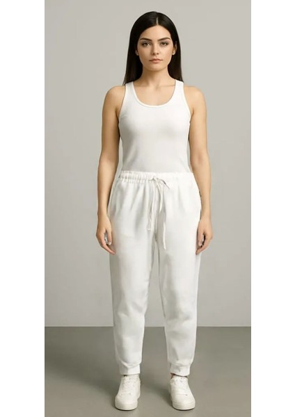 Kadın Jogger Kompakt Parlak Kumaş Yan Cepli Lastikli Paça Geniş Kesim Pijama Altı