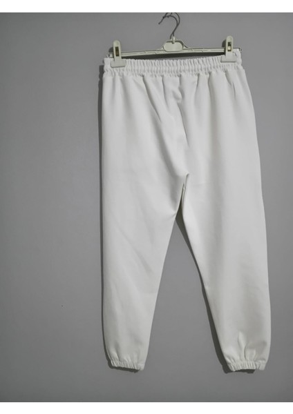 Kadın Jogger Kompakt Parlak Kumaş Yan Cepli Lastikli Paça Geniş Kesim Pijama Altı indirimleri