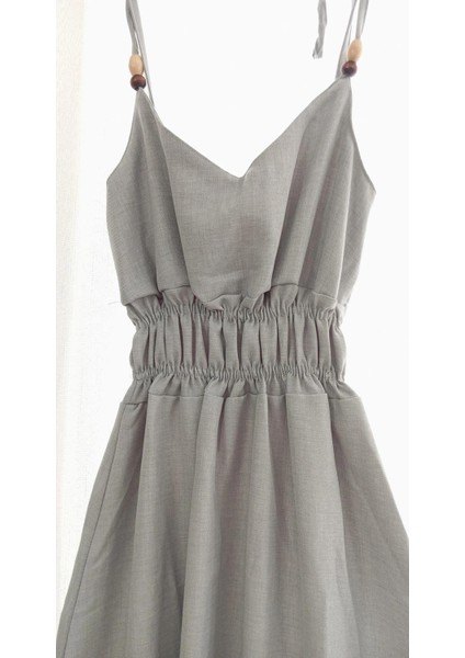 Is Berceste Gri Ip Askılı Beli Lastikli Keten Elbise fiyatları