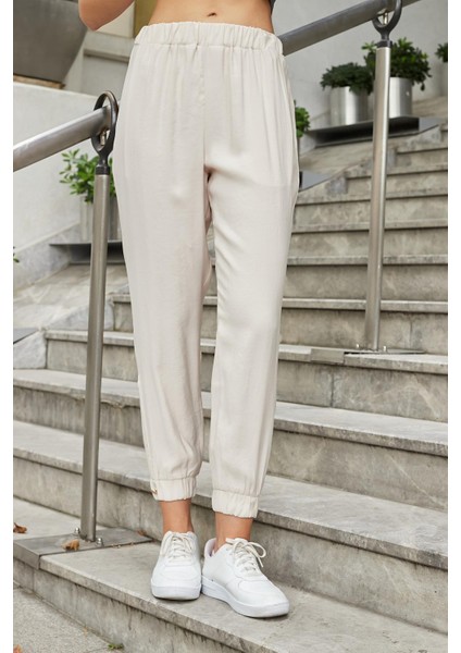Kadın Ipeksi Modal Kumaş Yüksek Bel Yan Cepli Paçası ve Beli Lastikli Havuç Kesim Pantolon-Bej fiyatları