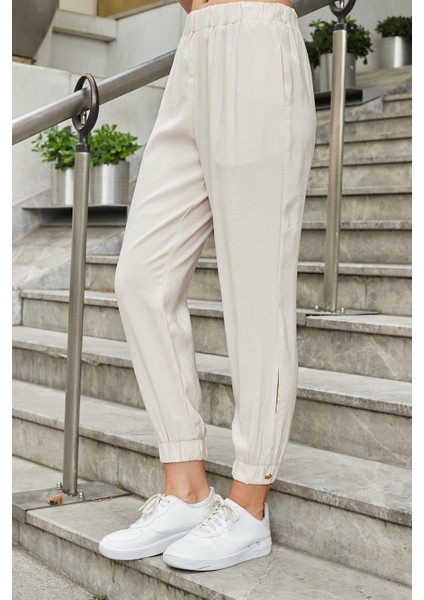 Kadın Ipeksi Modal Kumaş Yüksek Bel Yan Cepli Paçası ve Beli Lastikli Havuç Kesim Pantolon-Bej modelleri
