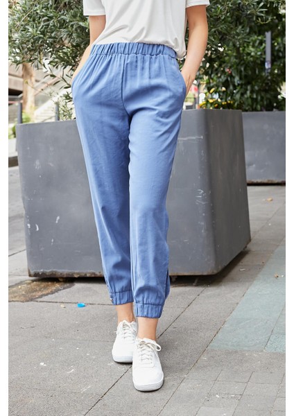 Kadın Ipeksi Modal Kumaş Yüksek Bel Yan Cepli Paçası ve Beli Lastikli Havuç Kesim Pantolon-Indigo modelleri