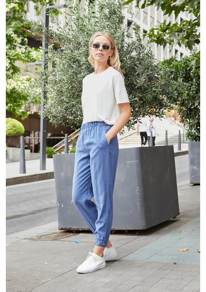 Kadın Ipeksi Modal Kumaş Yüksek Bel Yan Cepli Paçası ve Beli Lastikli Havuç Kesim Pantolon-Indigo fırsatları