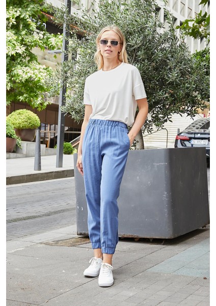 Kadın Ipeksi Modal Kumaş Yüksek Bel Yan Cepli Paçası ve Beli Lastikli Havuç Kesim Pantolon-Indigo indirimleri