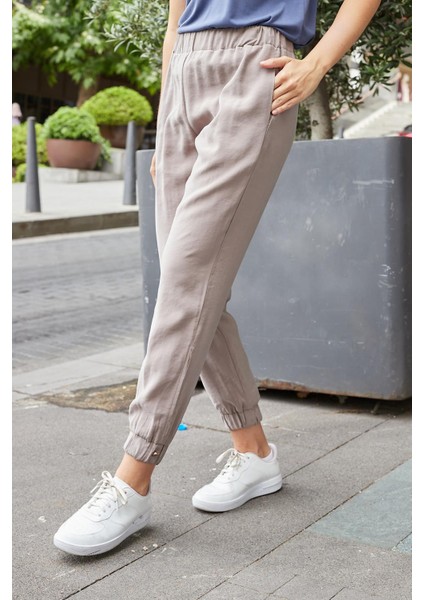 Kadın Ipeksi Modal Kumaş Yüksek Bel Yan Cepli Paçası ve Beli Lastikli Havuç Kesim Pantolon-Duman fırsatları
