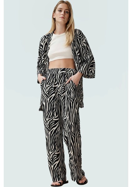 Rahat Kesim Leopar Desenli Örme Takım Günlük Şıklık Için Trend Tasarım Zarifane