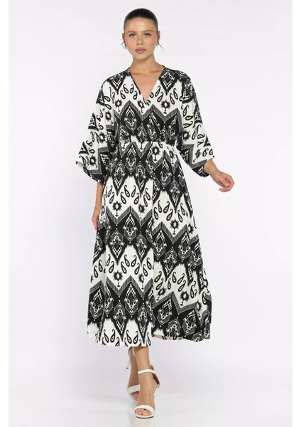 Kadın Kruvaze Yaka Bel Lastikli Yarasa Kol Yırtmaç Detaylı Desenli Elbise P-00017808