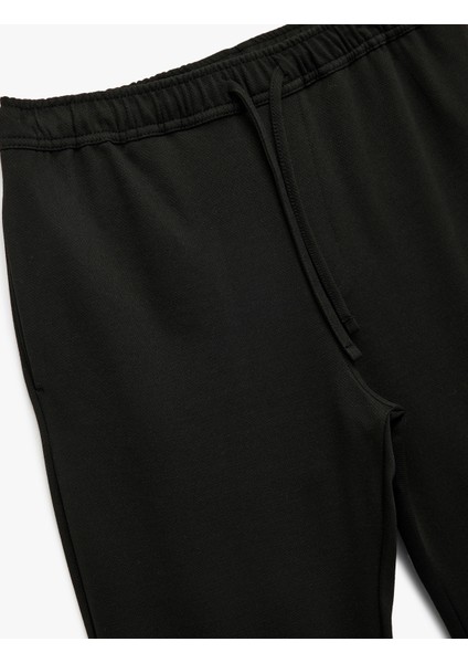 Straight Fit Pike Kumaş Cep Detaylı Beli Bağcıklı Pantolon modelleri