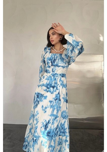 Mavi Arkası Gipeli Uzun Elbise fiyatları
