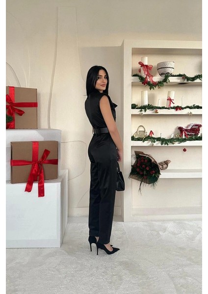 Siyah Vatkalı Kemerli Tulum fırsatları