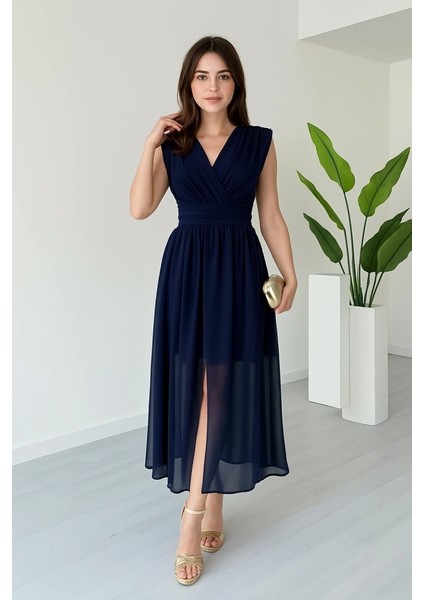 Kadın Vatkalı Şifon Kolsuz Kruvaze Yaka Yırtmaç Detaylı Şık Midi Elbise