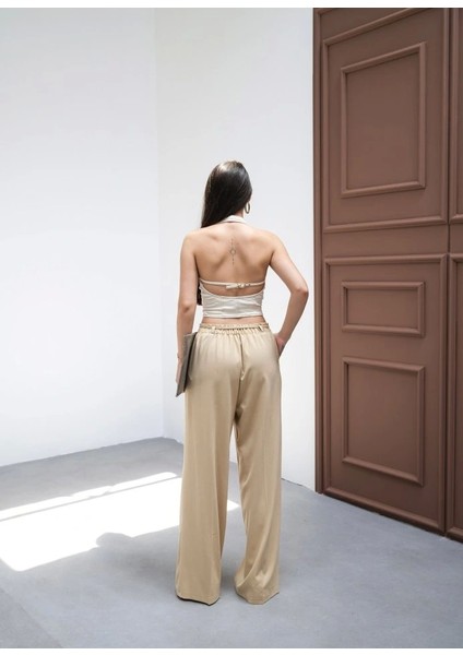 Beli̇ Lasti̇k ve Bağcikli Geni̇ş Paça Pantolon fiyatları