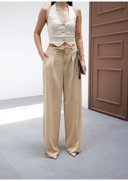 Beli̇ Lasti̇k ve Bağcikli Geni̇ş Paça Pantolon fırsatları