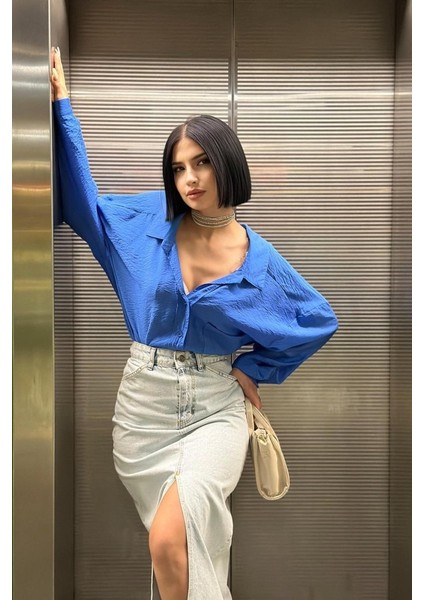 Kar Yıkama Yırtmaçlı Kot Etek modelleri