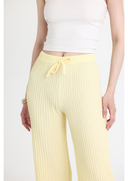 Sarı Geniş Paça Dökümlü Bürümcük Kumaş Pantolon 326 fırsatları