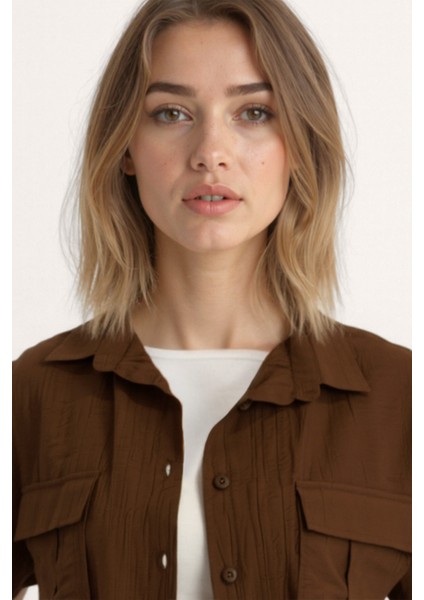 Kapak Cepli Krinkıl Kumaş Gömlek fırsatları