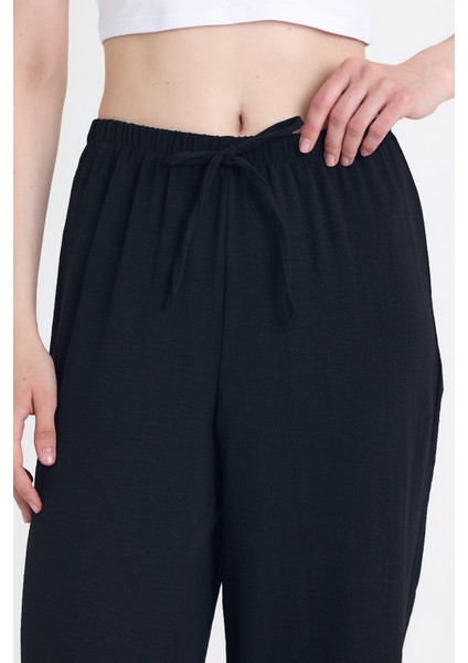 Siyah Beli Lastikli Bol Paça Dokuma Pantolon 4284-1 fırsatları
