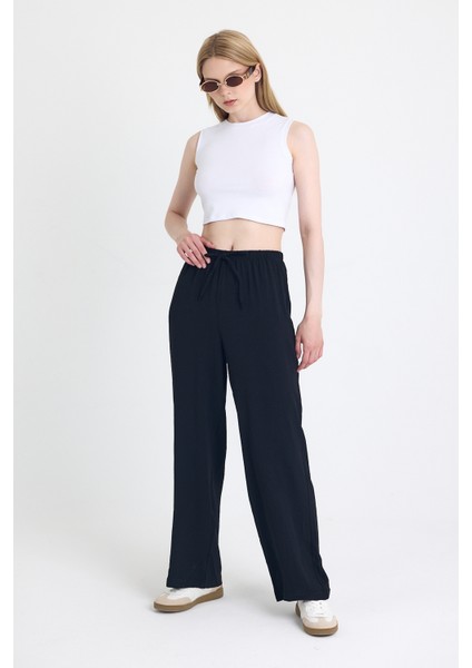 Siyah Beli Lastikli Bol Paça Dokuma Pantolon 4284-1 fiyatları