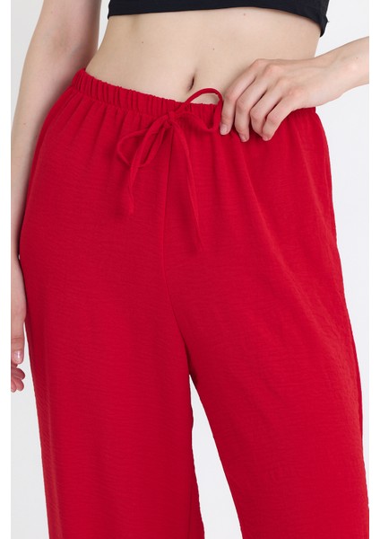 Kırmızı Beli Lastikli Bol Paça Dokuma Pantolon 4284-1 fırsatları