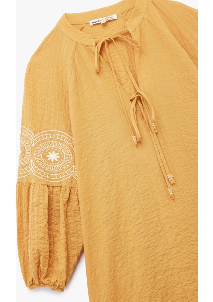 Pamuklu Işleme Detaylı Rahat Kalıp Uzun Balon Kollu Bağlamalı Yaka Mini Elbise modelleri