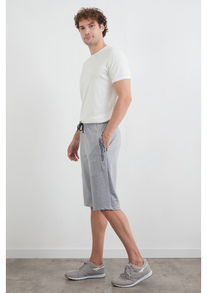 Beli Lastikli Cebi Fermuarlı Yazı Baskılı Kapri modelleri