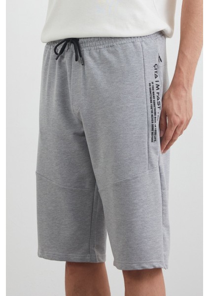 Beli Lastikli Cebi Fermuarlı Yazı Baskılı Kapri indirimleri