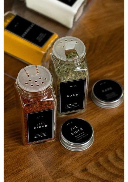 36'lı Şeffaf Pleksi Standlı Cam Kapaklı Baharatlık Seti Etiket Fırça Huni Yanında indirimleri