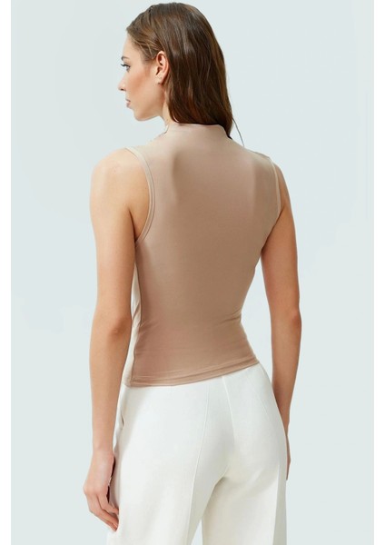 Vücuda Oturan Kolsuz Örme Bluz Dik Yaka Yazlık Rahat ve Şık Özel Tasarım modelleri