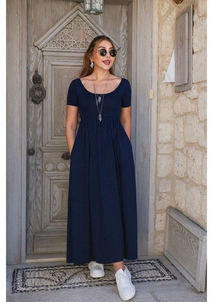 Kadın Kısa Kollu Yuvarlak Yaka Önden Yırtmaçlı Cepli Viskon Uzun Elbise modelleri