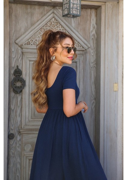 Kadın Kısa Kollu Yuvarlak Yaka Önden Yırtmaçlı Cepli Viskon Uzun Elbise fırsatları