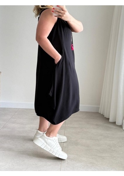 Eteği Asimetrik Kesim Nakışlı Elbise indirimleri