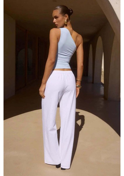 Sabino Pant: Rahat Kesim, Elastik Bel Bandı ve Yan Cepler ile Şıklığı Yakalayın