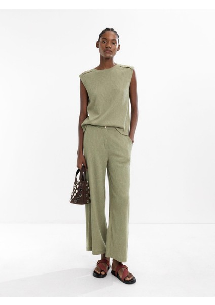 Cepli ve Dokulu Pantolon