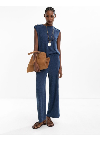 Cepli ve Dokulu Pantolon