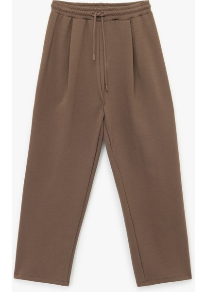 Pamuklu Rahat Kalıp Pileli Beli Bağcıklı Geniş Paça Eşofman Altı