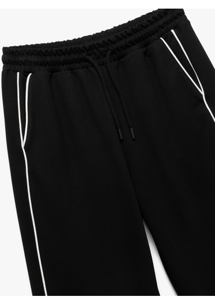 Yüksek Bel Lastikli Cep Detaylı Biyeli Oversize Geniş Paça Eşofman Altı indirimleri